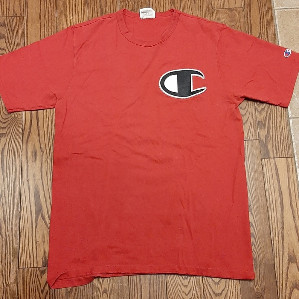 Champion T-shirt red graphic font logo.